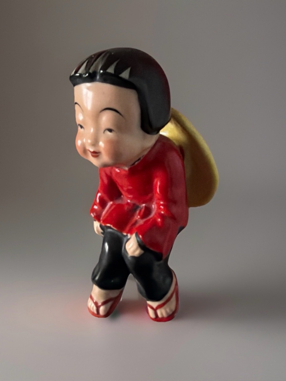 Vintage Mid-Century Asian "shelf sitter" ceramic figurine. Good Condition.